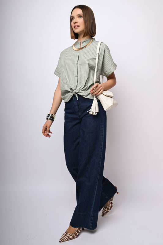 Jeans a gamba ampia con risvolto